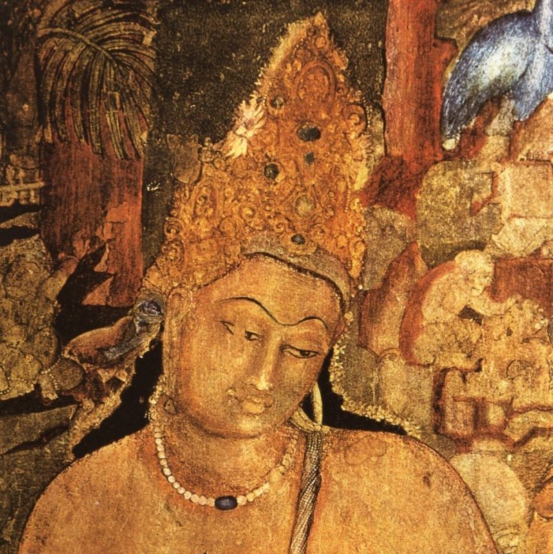Detail of the Ajanta Cave 1 mural of the bodhisattva Padmapani — the serene golden-skinned figure with downcast eyes and slightly tilted head, wearing a tall jewelled crown and a pearl necklace with a blue central stone, with attendant figures and a palm painted behind