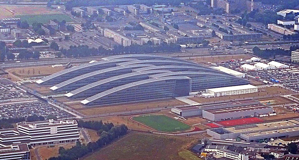 Aerial view of the NATO headquarters building in Brussels, its interlocking finger-shaped wings set in an open site