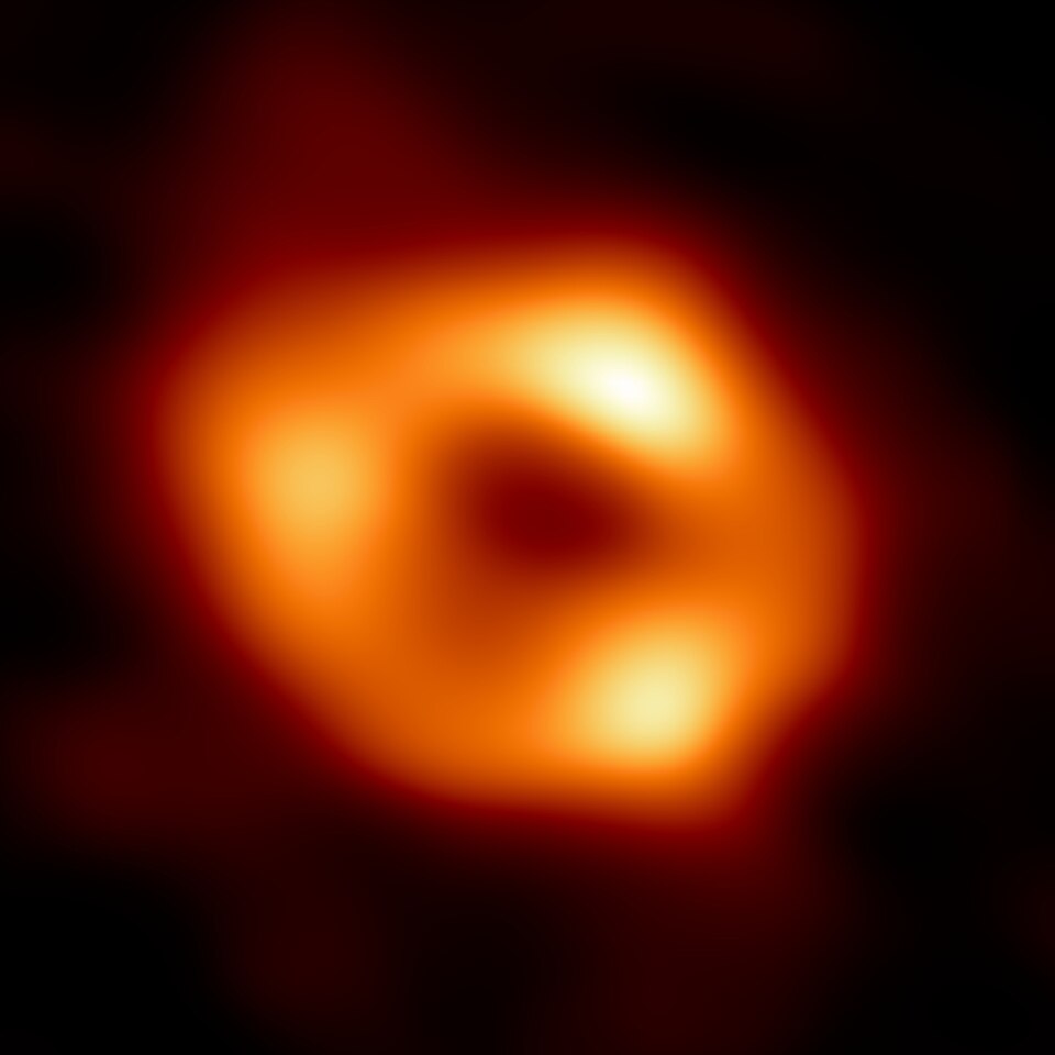 The Event Horizon Telescope image of Sagittarius A*: a bright orange ring of emission around a dark central shadow