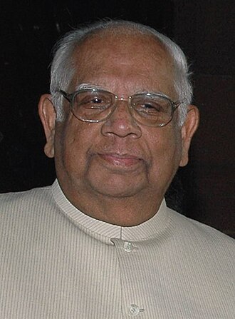 Head-and-shoulders portrait of Somnath Chatterjee, an elderly man with grey hair and rimmed spectacles wearing a cream kurta