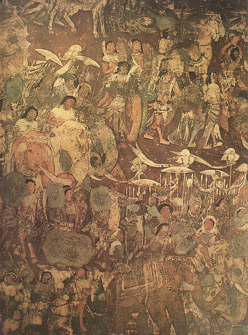 A crowded Ajanta wall painting showing a royal procession: riders on decorated elephants, parasol bearers and attendants in patterned garments, headdresses and heavy jewellery