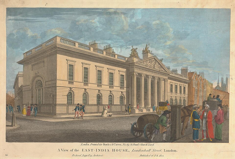 An 1802 hand-coloured print of East India House in Leadenhall Street, London: a neoclassical building with a columned portico and sculpted pediment, with carriages and figures in the street outside