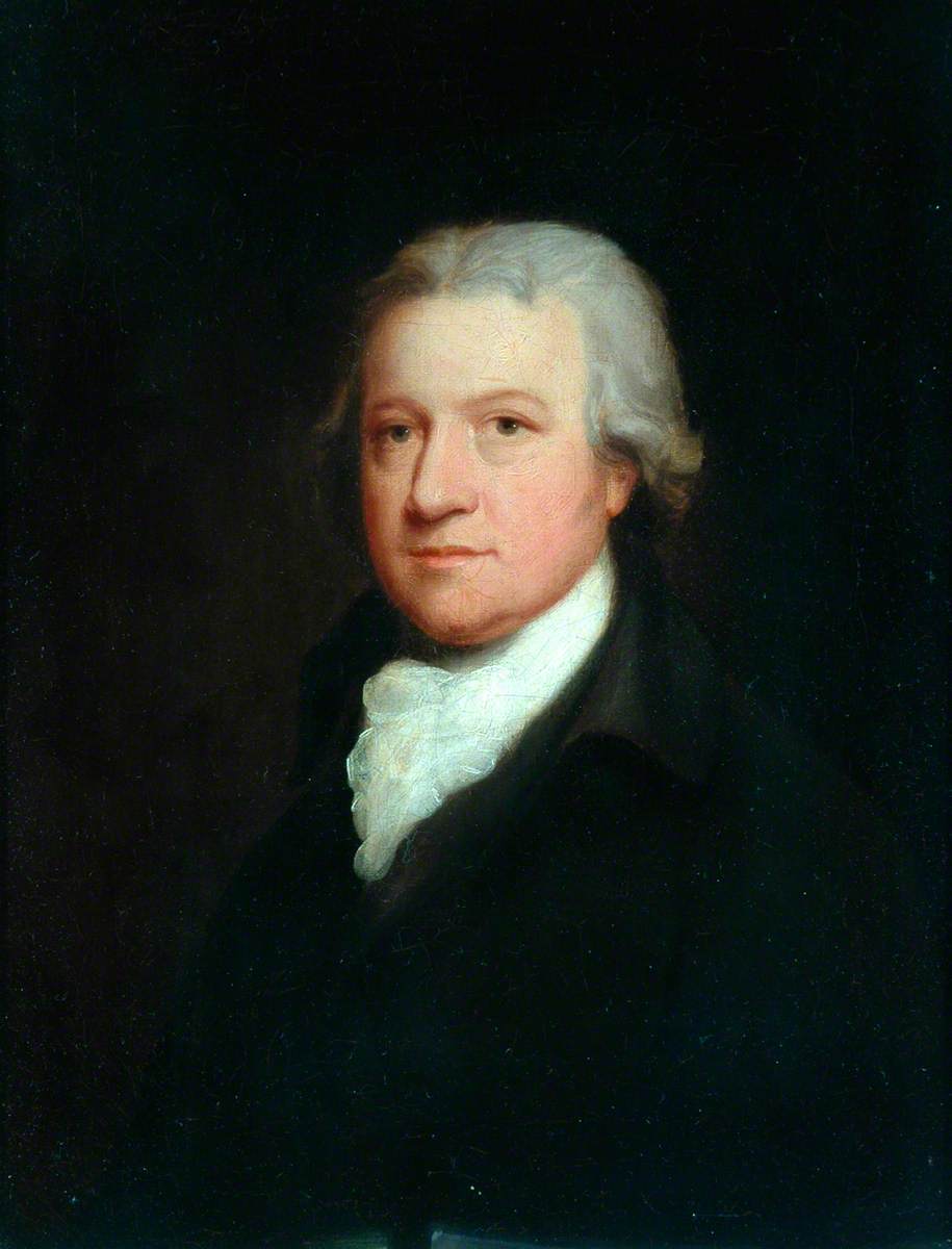 An oil portrait of Edmund Cartwright, grey-haired and in a dark coat with a white cravat, against a dark background.