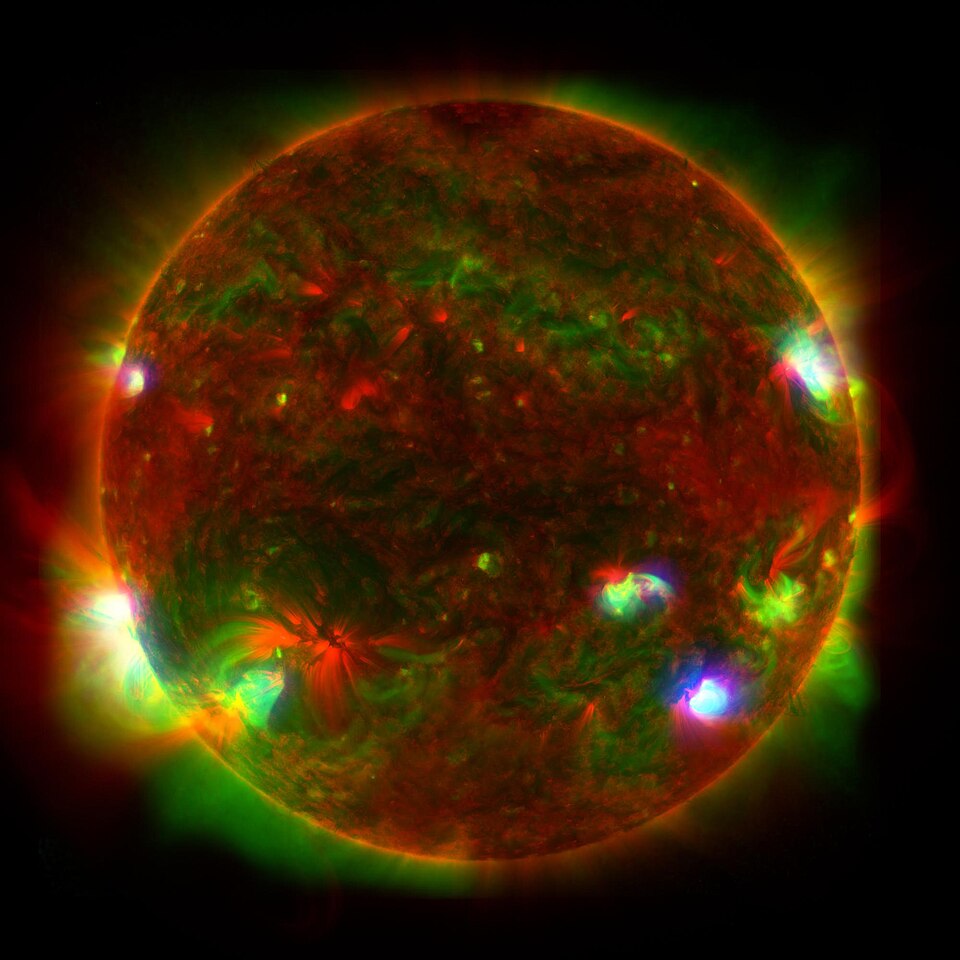 The Sun imaged from space, its disc and active regions showing the star radiating energy into surrounding space.