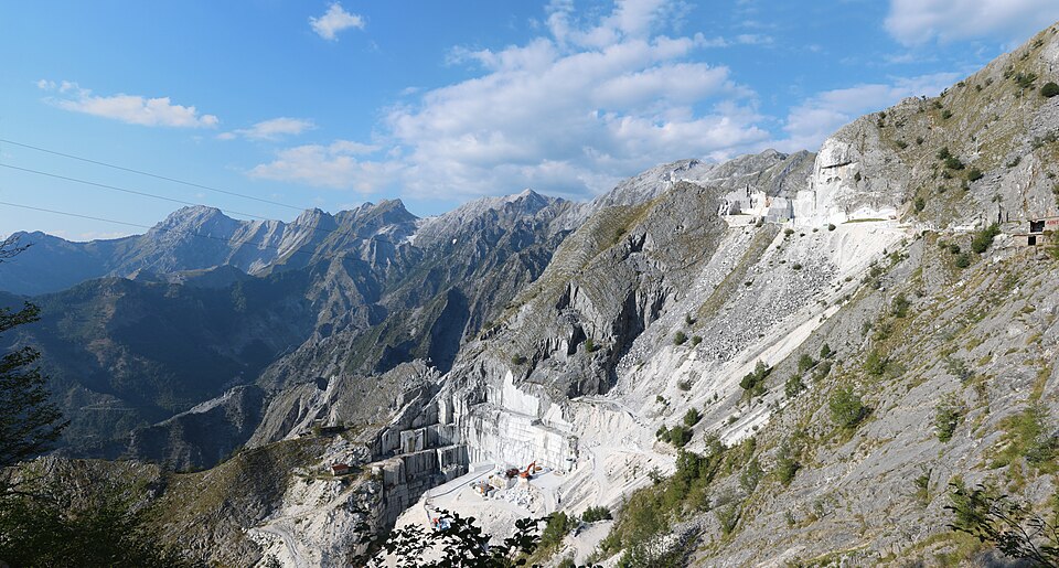 White marble quarry faces cut into the Carrara mountainside.