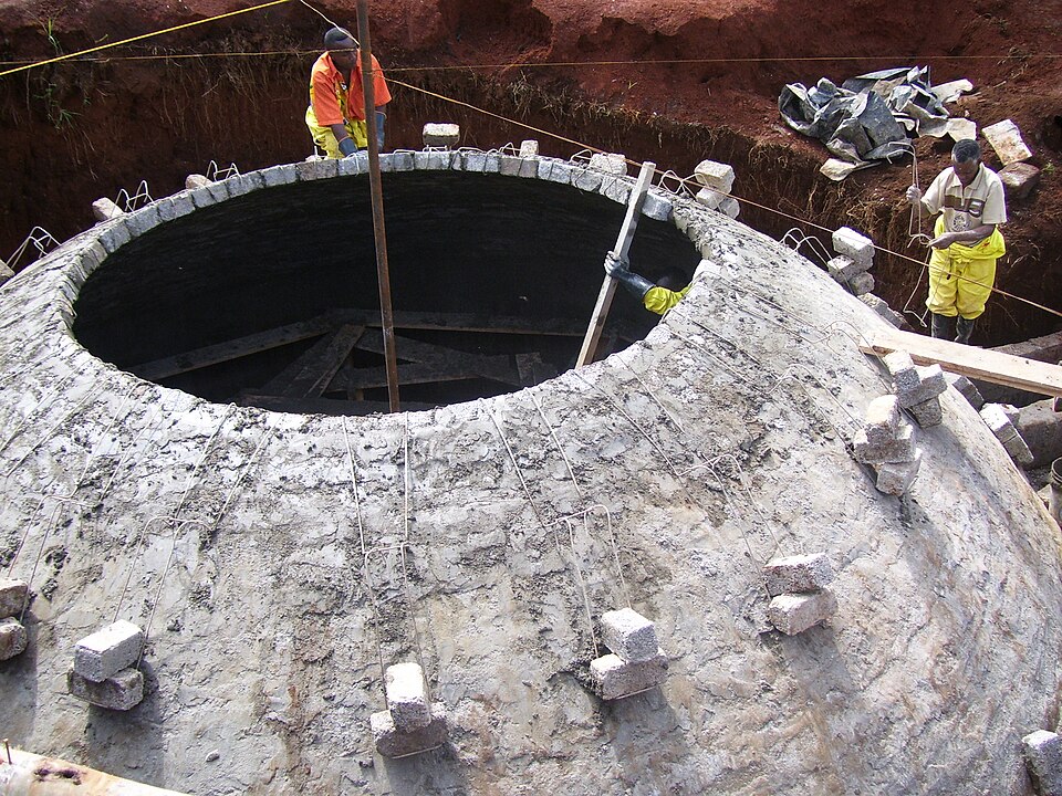 The dome-shaped digester of a rural biogas (gobar gas) plant during construction.