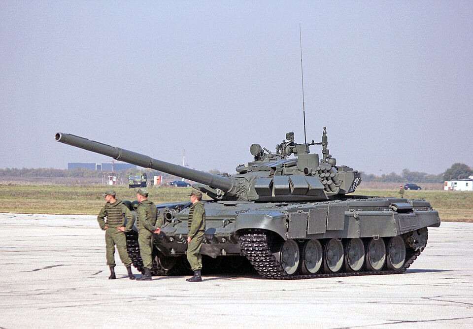 A Russian Army T-72 main battle tank with troops during a joint military exercise