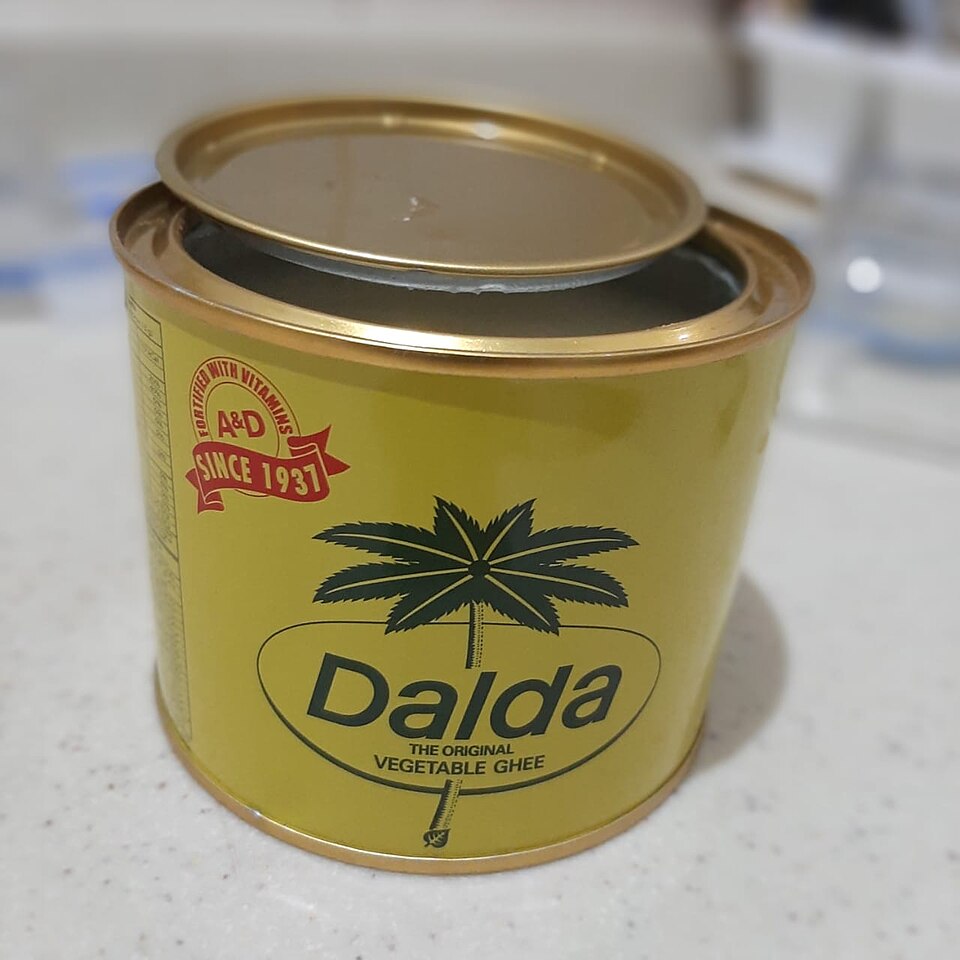 Opened tin of Dalda vanaspati hydrogenated vegetable ghee