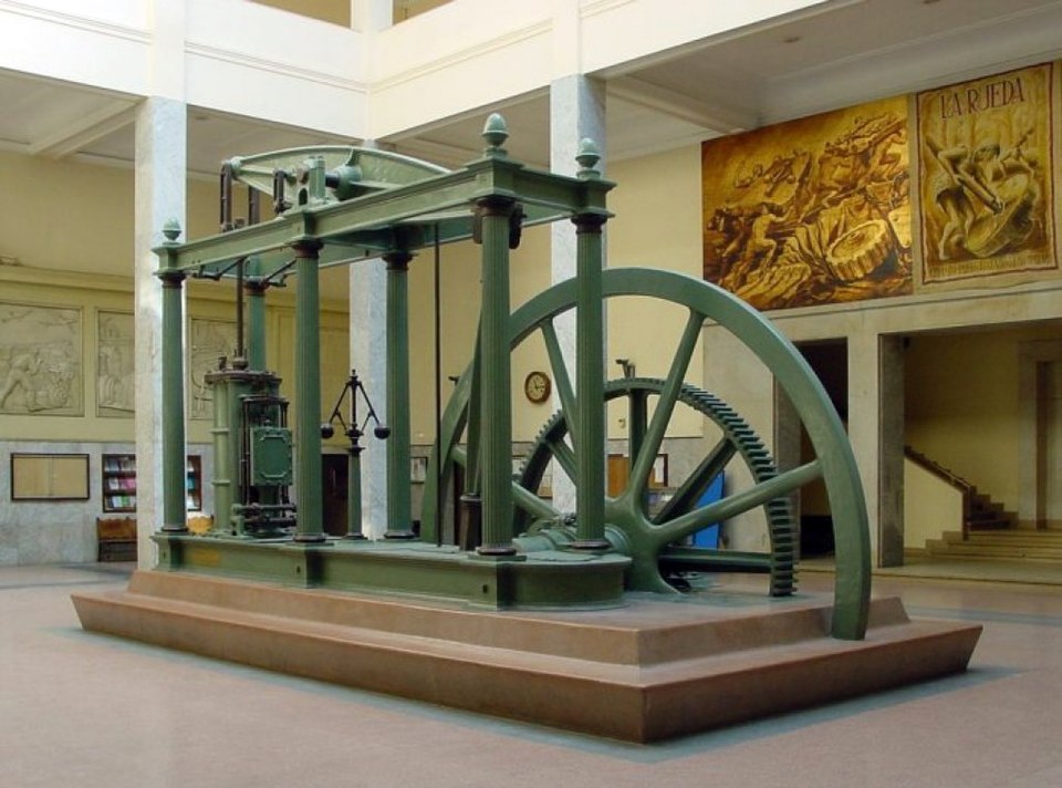 A Watt beam steam engine of the Industrial Revolution with flywheel and governor