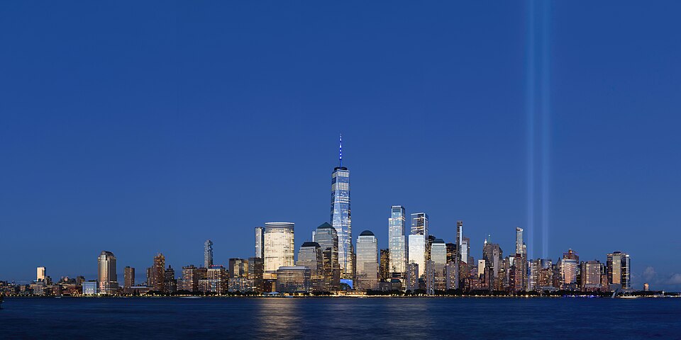 The Manhattan skyline of New York City seen across the water at dusk