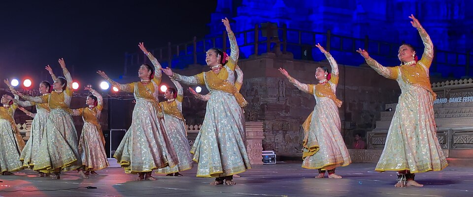 Kathak dancers performing in classical costume at the Khajuraho Dance Festival