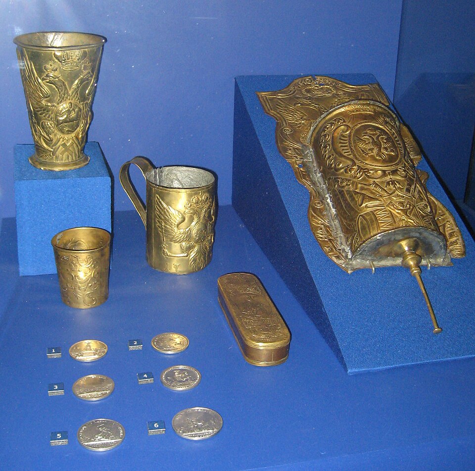 Polished golden brass vessels and objects, brass being an alloy of copper and zinc