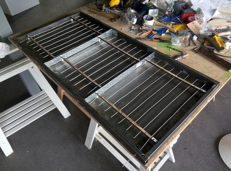 A heating element strung with nichrome resistance wire, a high-resistivity alloy