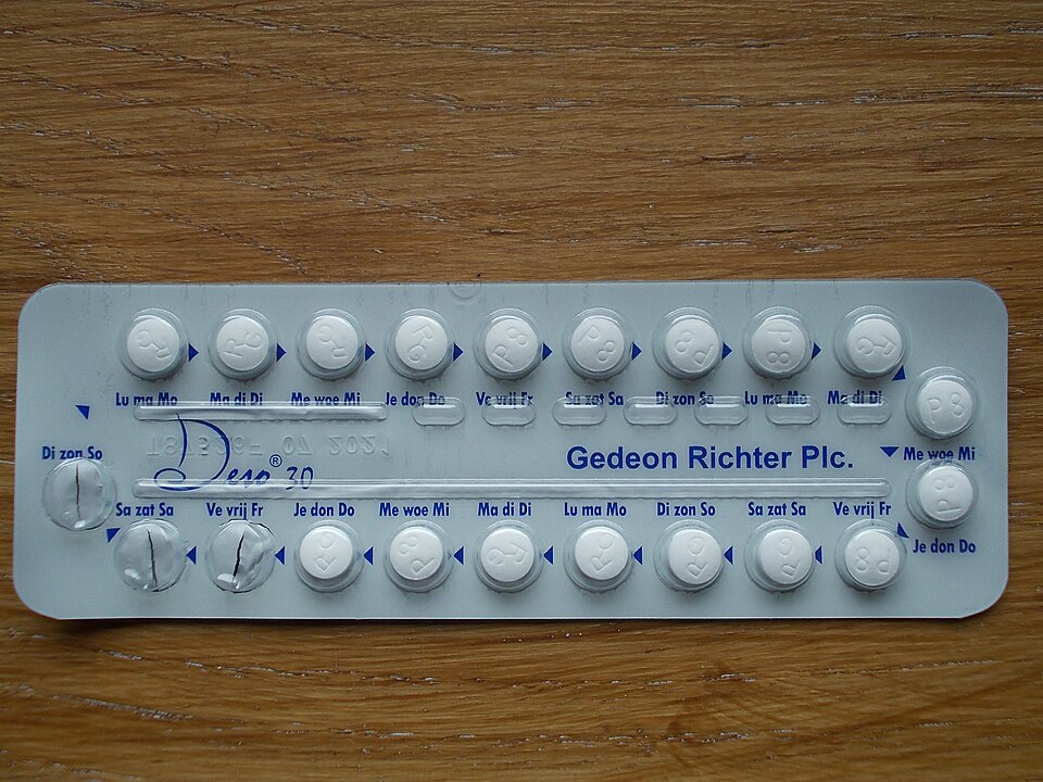 A blister pack of oral contraceptive pills with day-of-week markings