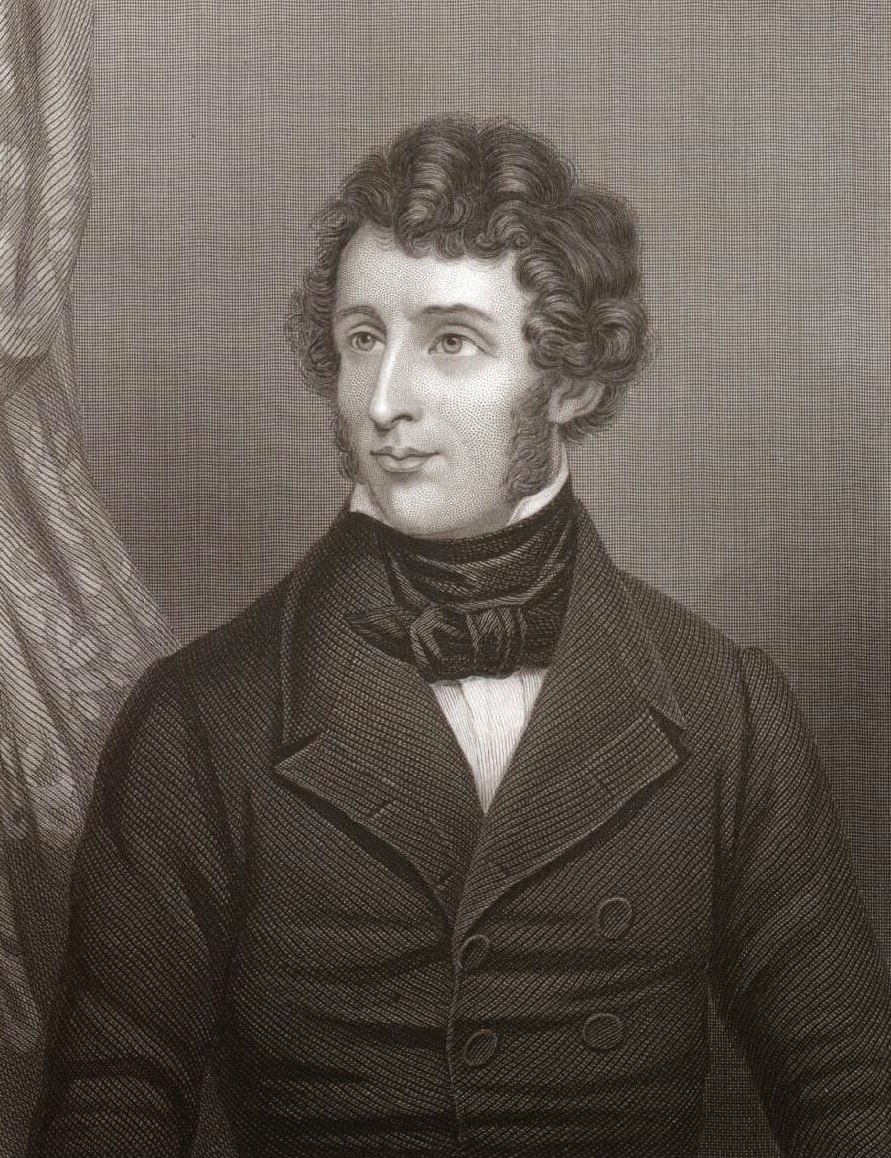 A nineteenth-century engraved portrait of the German chemist Friedrich Wohler, shown head and shoulders with dark curly hair, a high black stock and a dark double-breasted coat.