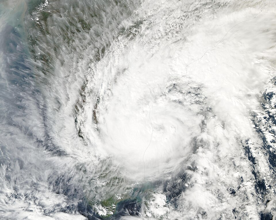 MODIS satellite image of Tropical Cyclone Michaung's spiral cloud bands over the Bay of Bengal