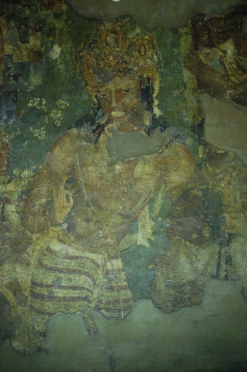 Ajanta Cave 1 mural of the Padmapani Bodhisattva holding a lotus
