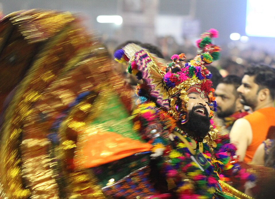 Dancers in vibrant traditional attire performing the Garba folk dance during Navratri in Gujarat