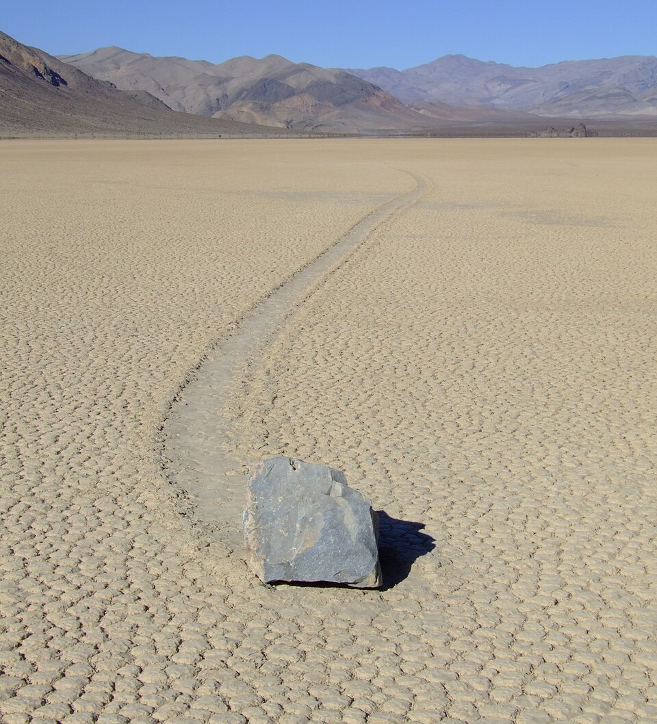 Cracked, dry lake bed of Racetrack Playa, a playa on a desert basin floor in Death Valley