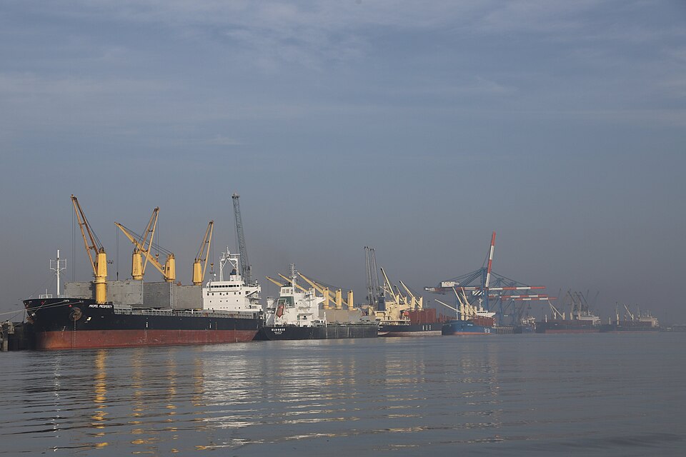 Cargo ships berthed with dockside cranes at Kandla (Deendayal) Port on the Gulf of Kutch