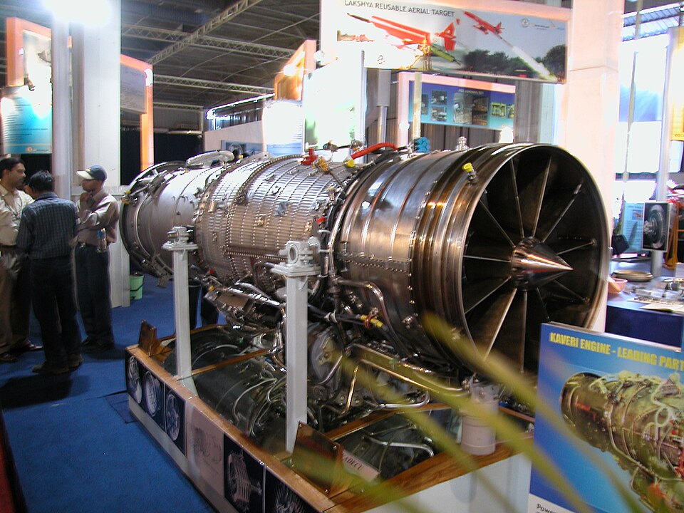 The DRDO/GTRE Kaveri jet engine displayed under a KAVERI ENGINE banner at a defence exhibition