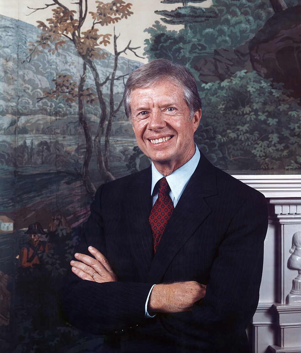 Portrait of Jimmy Carter, 39th US President, smiling with arms folded