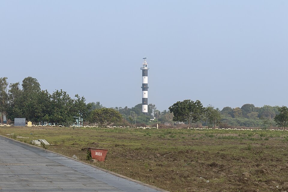 The black-and-white banded lighthouse at Machilipatnam on the Coromandel coast, seen from Manginapudi Beach