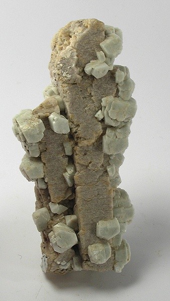 Cream-coloured microcline feldspar mineral specimen