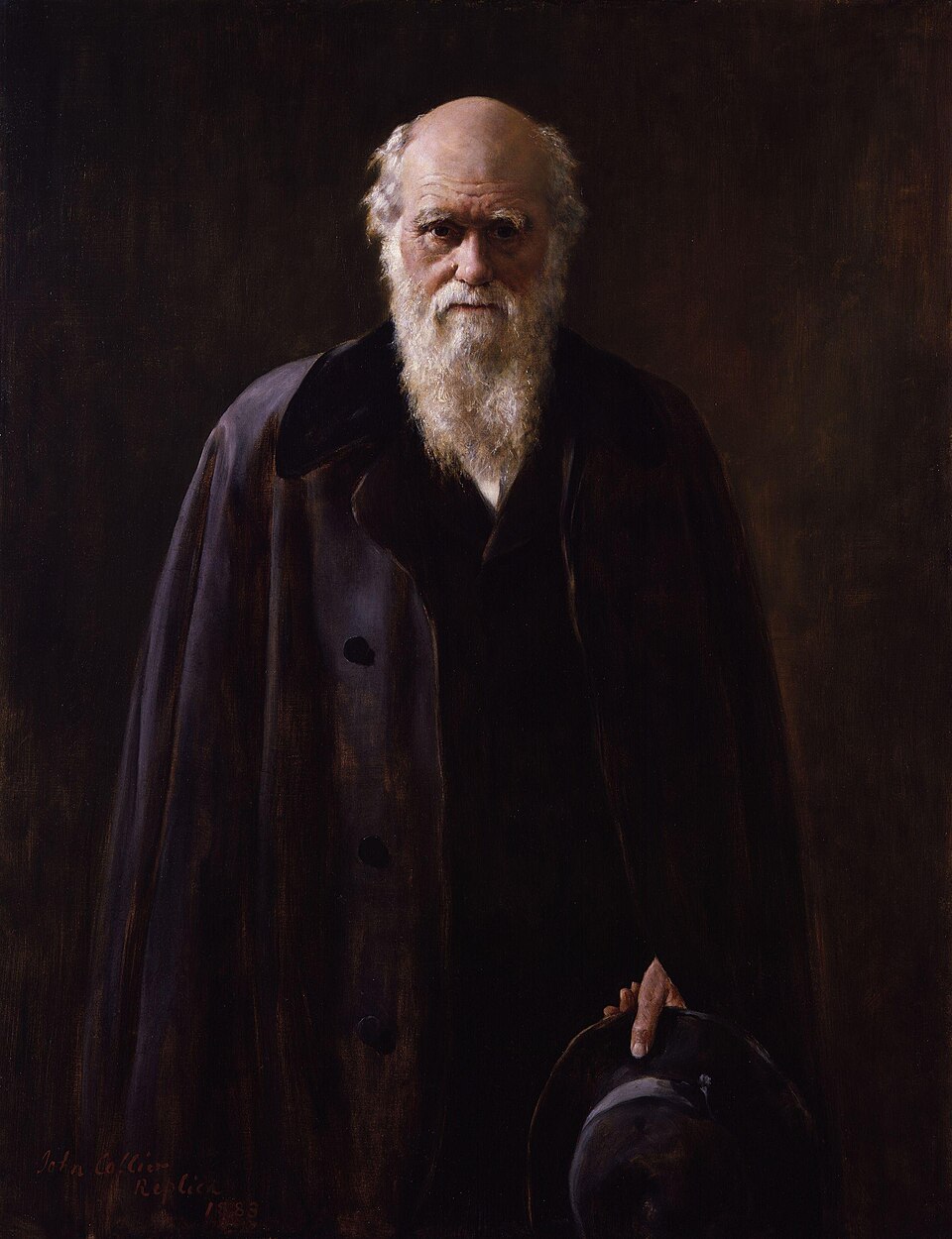 Portrait of naturalist Charles Darwin, an elderly bearded man in a dark cloak
