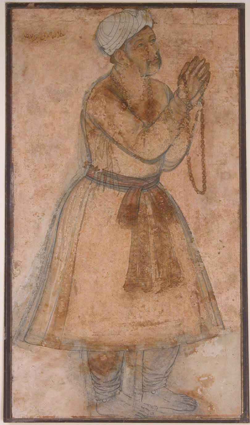 Aged Mughal drawing of Emperor Akbar standing in prayer, holding a string of prayer beads, wearing a turban and long robe