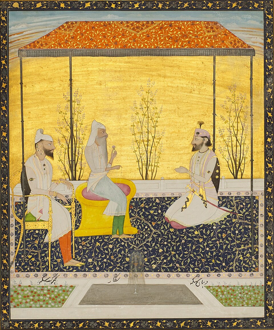 A Sikh-era miniature painting showing Maharaja Ranjit Singh seated on a golden stool beneath an orange canopy, flanked by two courtiers, with a garden and fountain below.