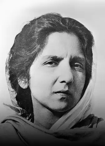 A black-and-white 1940s portrait of Aruna Asaf Ali, Indian independence activist, wearing a light head covering